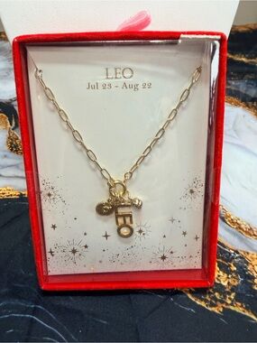 LEO necklace NIB!